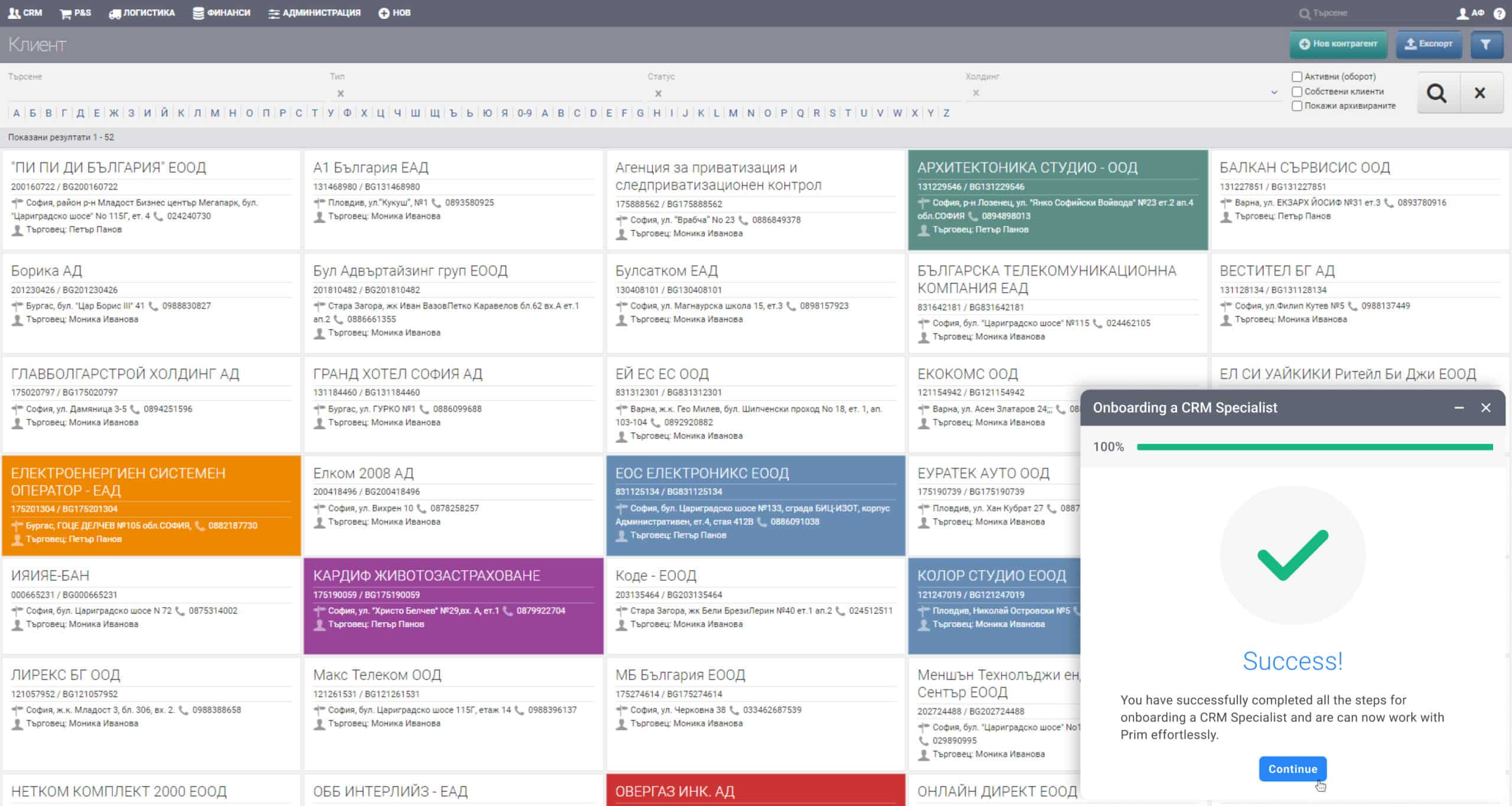 A screenshot of a legacy ERP system with a docked modal positioned in the bottom right corner, letting the user know that it has completed successfully all the onboarding tasks